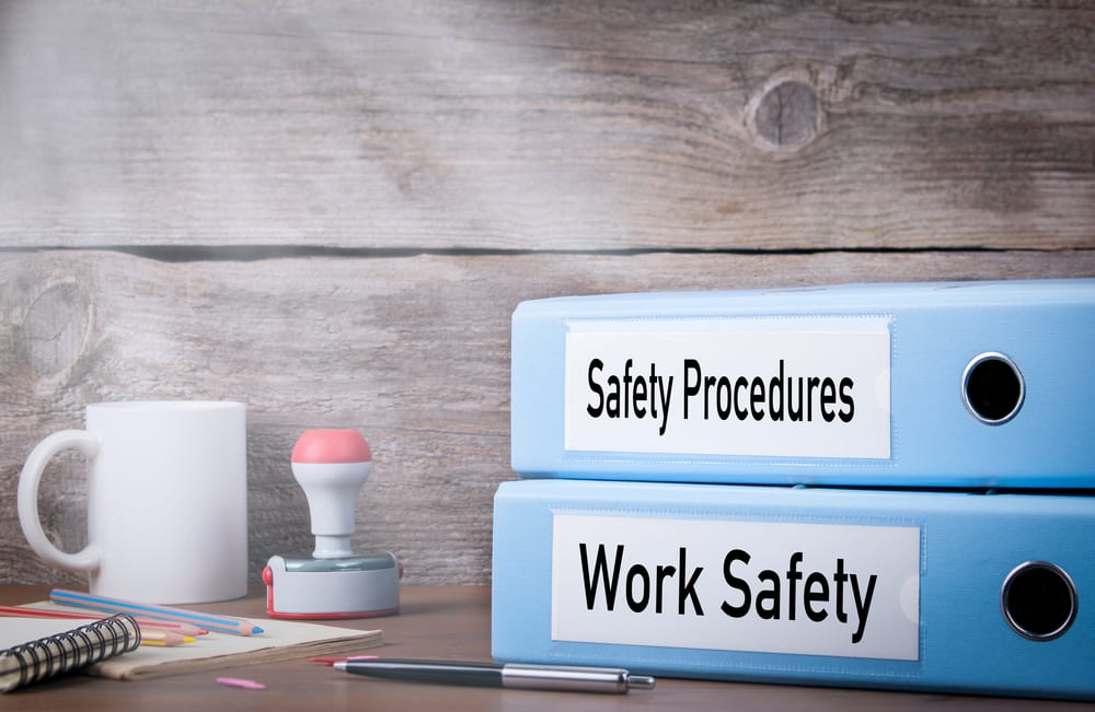 Binders with info about workplace safety and safety procedures